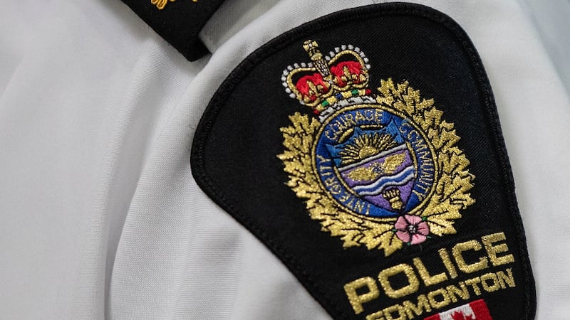 City employee charged with impersonating Edmonton police, sex assault