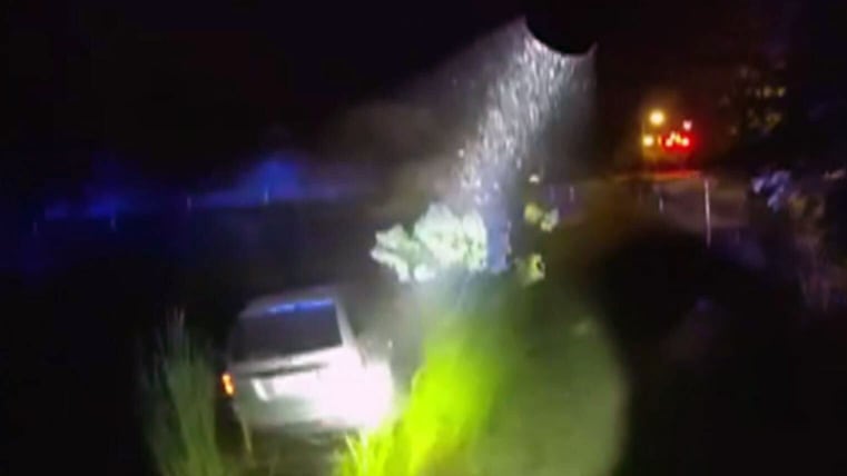 Tennessee deputy jumps into action after man drives into pond right in front of his cruiser