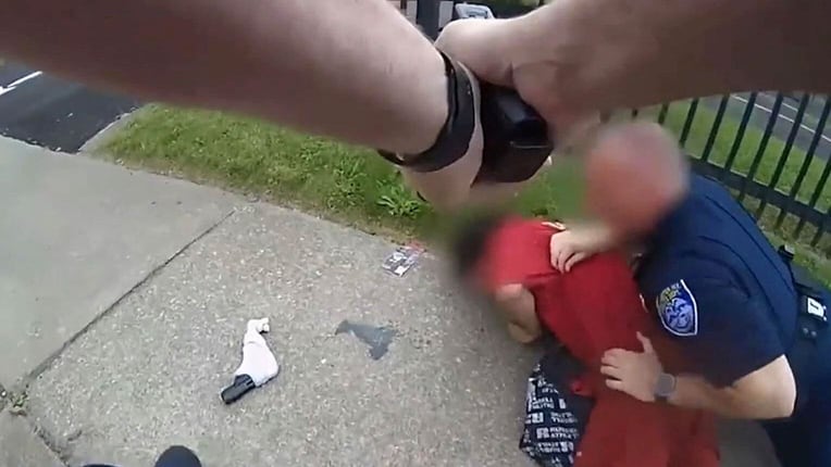 U.S. police release bodycam footage of chase, shootout with murder suspect